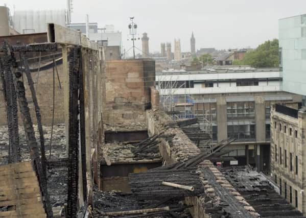 Opinion is slit over whether or not the Glasgow School of Art building should be rebuilt.