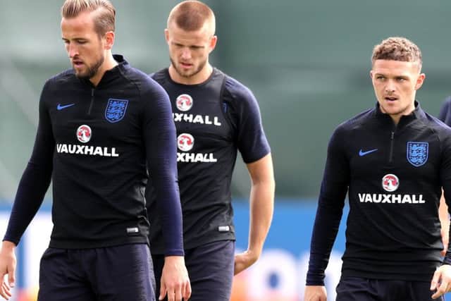 Harry Kane, Eric Dier and Kieran Trippier take a break during a training session in St Petersburg. Picture: Getty Images