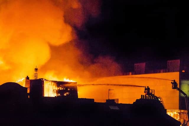Flames tore through the famous Mackintosh building last Friday night and spread to nearby properties including the O2 ABC. Picture: John Devlin.