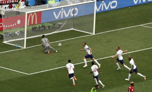 England's Harry Kane, top right, celebrates his first penalty during the 6-1 win over Panama. Picture: Darko Bandic/AP