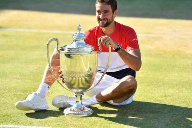 Marin Cilic poses with his trophy after defeating Novak Djokovic in the final of the Fever-Tree Championships at Queens yesterday. Picture: AFP/Getty