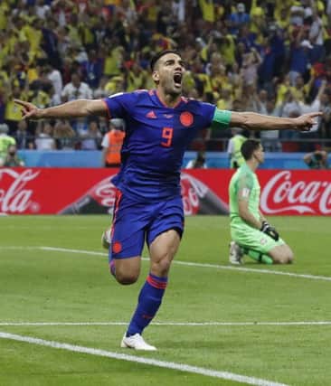 Colombia's Radamel Falcao celebrates after scoring against Poland. Picture: Frank Augstein/AP
