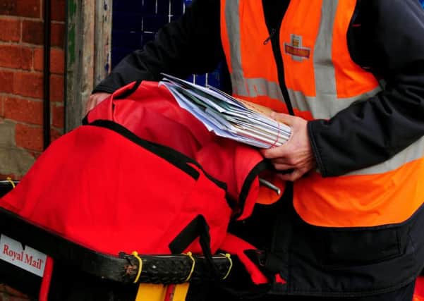 Royal Mail employees bitten by dogs have been left with permanent and disabling injuries, with more than 44 attacks every week. Picture: PA