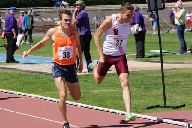 A tight 800m finish between Chris O'Hare, left, and Neil Gourley in a guest race at Grangemouth. Picture: Alex Barr