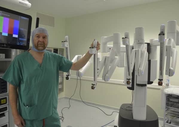 Cardiothoracic consultant Alan Kirk with the Â£1.3m Da Vinci surgical system at the Golden Jubilee National Hospital in Clydebank