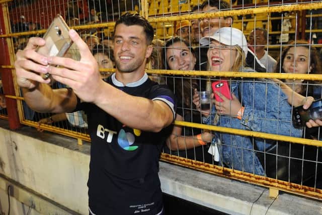 Adam Hastings takes a selfie with the Argentina fans. Picture: David Gibson/Fotosport