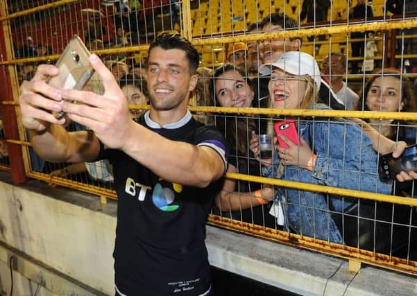 Adam Hastings takes a selfie with the Argentina fans. Picture: David Gibson/Fotosport