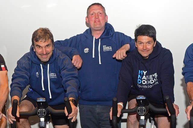 Former Scotland rugby internationals Iwan Tukalo, left, and Roger Baird, right, are joining with Doddie Weir, centre, to raise funds for Doddie5 24hr Spinathon at David Lloyd in Edinburgh.  Picture: Jon Savage