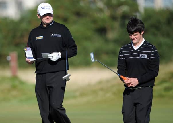 Craig Lawrie, pictured playing with his dad Paul in the Dunhill Links Championship, came through a regional Open qualifier at Panmure. Picture: Jane Barlow