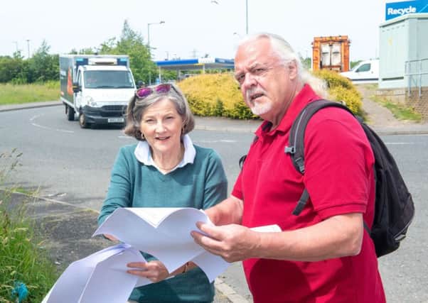 The groups' chairs Bill Kerr-Smith & Marnie Crawford at the proposed Starbucks and KFC site.