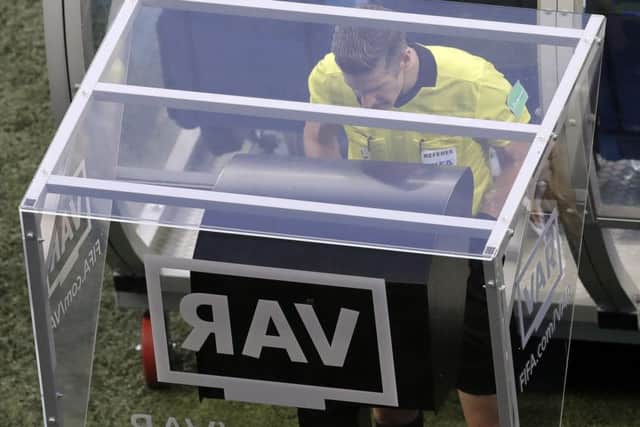 Referee Matt Conger watches the VAR system during the match between Nigeria and Iceland. Picture: AP