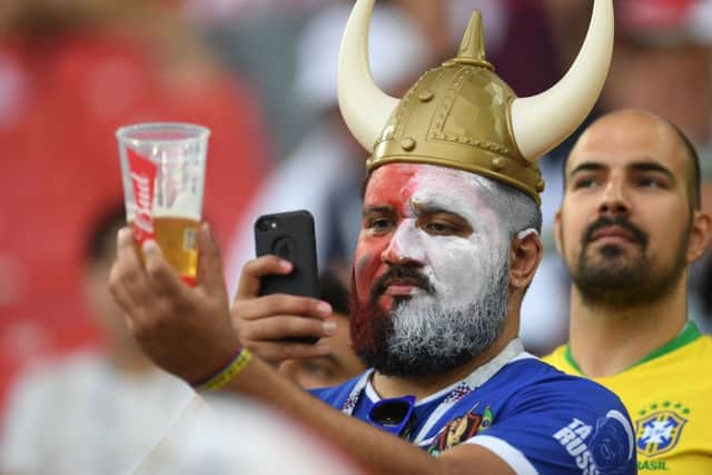Fans have been enjoying beer at the World Cup, and UEFA has given the go ahead for drink at European club matches. Picture: Getty Images