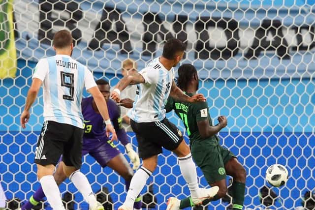 Marcus Rojo provides Argentina with a late winner to secure second place in Group D. Picture: Getty.