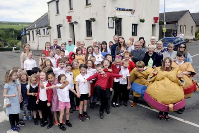 People United for Banton celebrate taking over The Swan Inn. Pic: Michael Gillen
