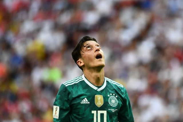 Germany midfielder Mesut Ozil reacts during the shock defeat by South Korea which saw the World Cup holders eliminated. Picture: Jewel Samad/AFP/Getty Images