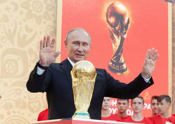 Putin and the world cup (Photo by Oleg Nikishin - FIFA/FIFA via Getty Images)