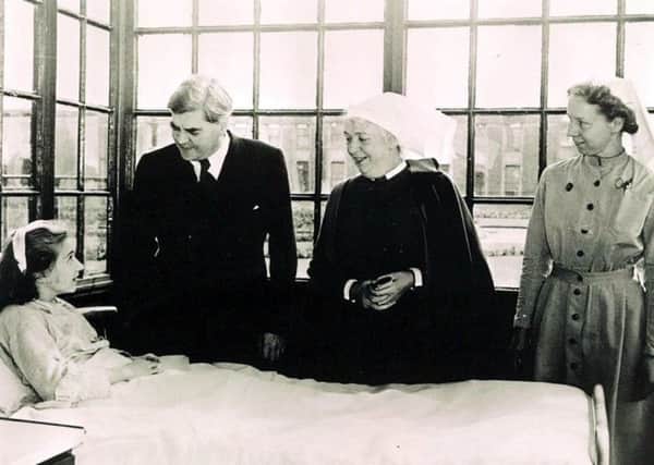 The NHS's first patient Sylvia Diggory, 13, speaks to the then Health Secretary Aneurin Bevan in 1948 at Trafford General Hospital in Greater Manchester (Picture: Trafford Healthcare NHS Trust/PA)