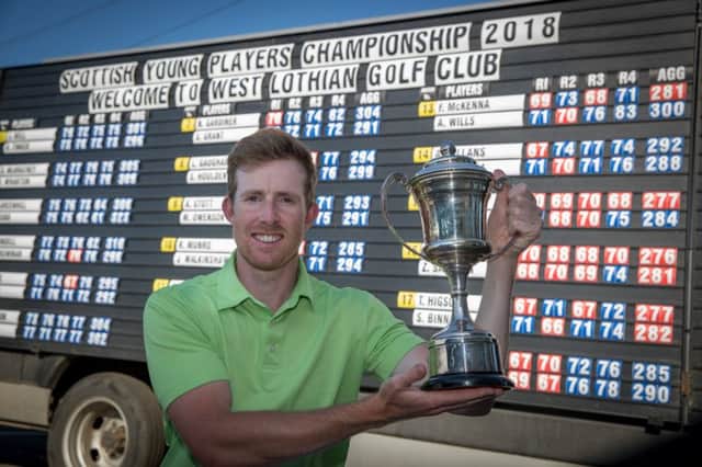 Graeme McDougall (Golf Housze Club, Elie) with the Scottish Young Pros' trophy after his victory at West Lothian. Picture: Kenny Smith