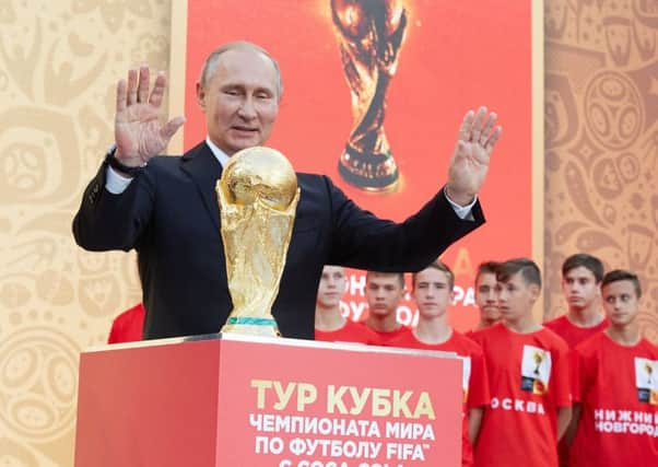 News that two more people are suffering from exposure to the Novichok nerve agent comes as Putin basks in the glow of the World Cup in Russia (Picture: Fifa via Getty)