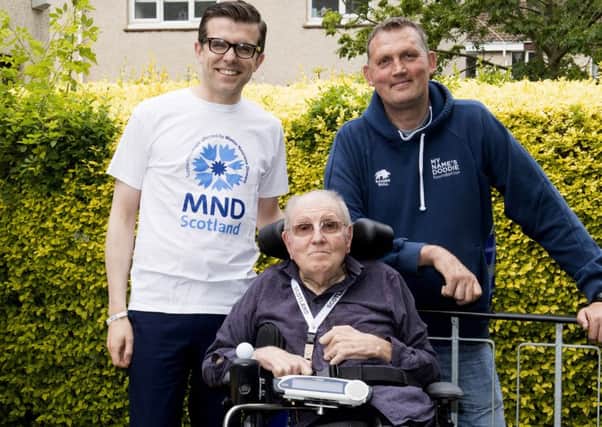 Doddie Weirs foundation has donated Â£100,000 to MND Scotland for grants services. 

Pictured: Lawrence Cowan (MND Scotland) (left), Jim Grant and Doddie Weir. Picture: Paul Devlin/SNS