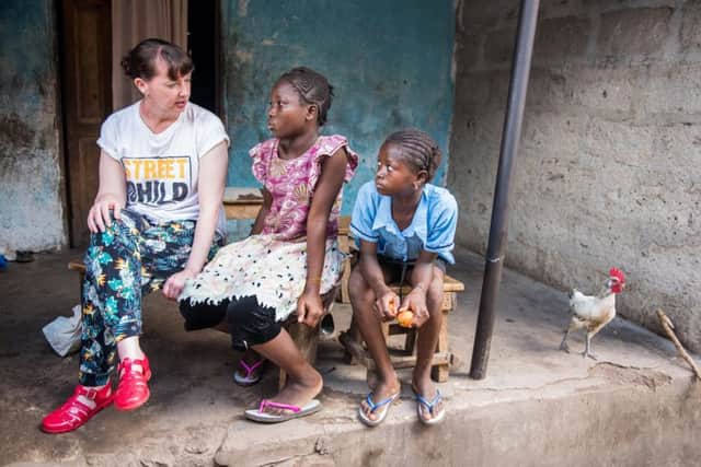 Undated handout photo issued by Street Child of Pauline Cafferkey with Ebola orphans