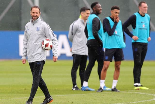 The morning after the night before: Gareth Southgate back in training with his England players. Picture: PA