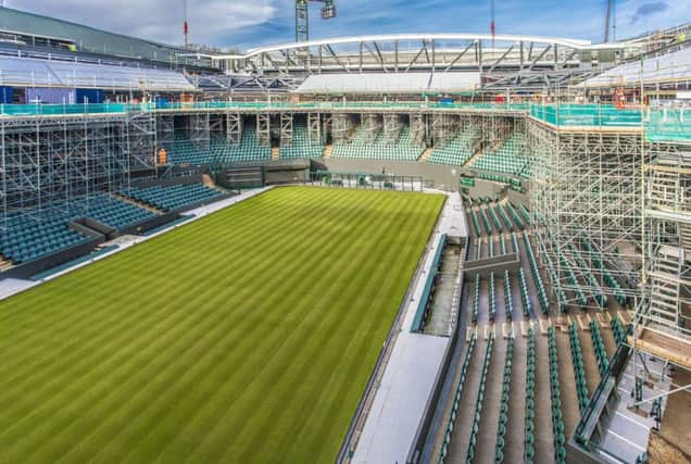 The firms projects include construction of Wimbledons No.1 court roof. Picture: Contributed