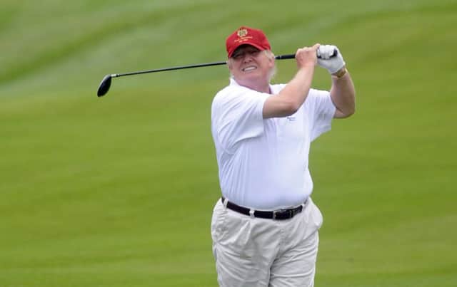 Donald Trump plays a round at his newly opened golf links in Aberdeenshire in July 2012. Picture: Phil Wilkinson/TSPL