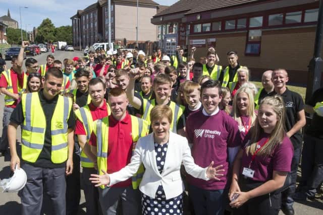 Nicola Sturgeon with apprentices from Wheatley Group and its partner organisation, City Building (Glasgow). Picture: Jeff Holmes
