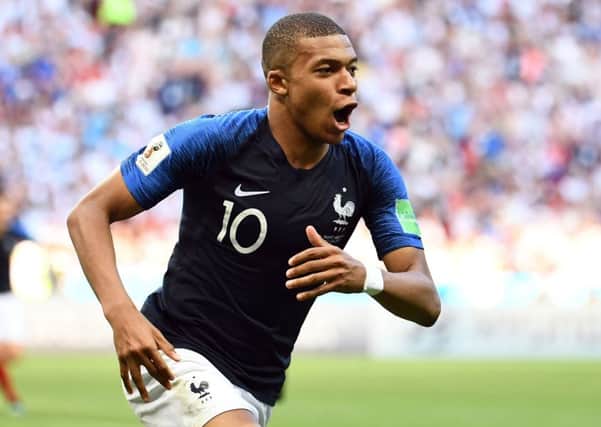France's Kylian Mbappe celebrates after scoring the third goal against Argentina. Picture: Franck Fife/AFP/Getty Images