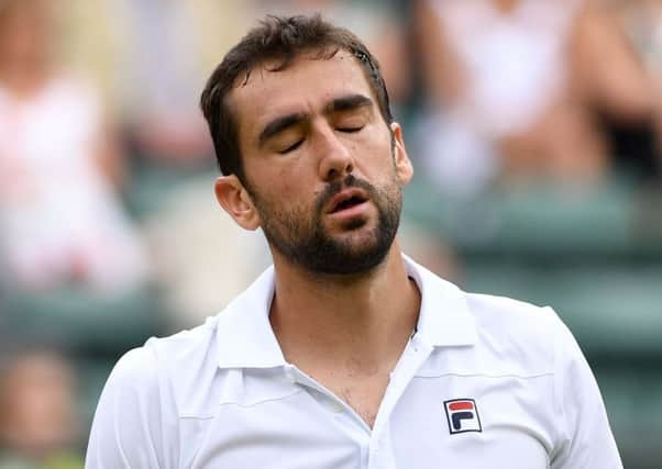 Marin Cilic reacts during his secon round loss to Argentina's Guido Pella. Picture: AFP/Getty