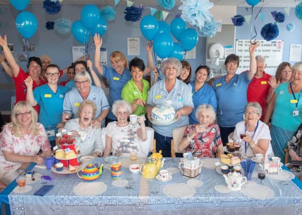 Patients and staff at New Victoria hospital, Glasgow, enjoying a NHS Big7Tea party with donations from Asda. Picture: Ian Georgeson