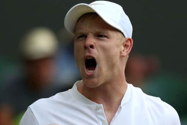 Britain's Kyle Edmund celebrates a point against Bradley Klahn in their second round clash on Centre Court. Picture: Getty Images