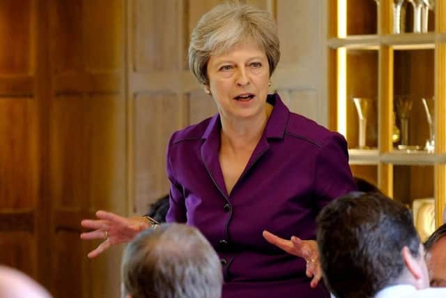 Theresa May flew to Germany to reveal her proposal to Chancellor Angela Merkel before she presented it to her own Cabinet in an attempt to obtain 
pre-approval. Picture: SWNS