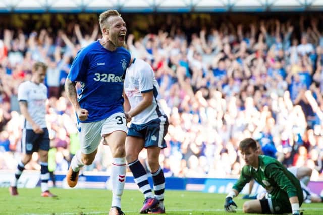 Rangers' Scott Arfield celebrates his goal to make it 3-0. Picture: Ross Parker/SNS
