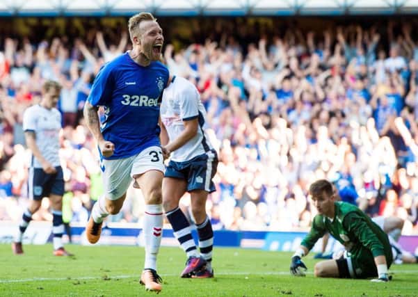 Rangers' Scott Arfield celebrates his goal to make it 3-0. Picture: Ross Parker/SNS