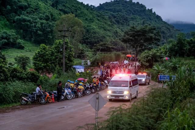 An ambulance carrying one of the boys rescued from Tham Luang Nang Non cave heading towards the hospital. Picture:  Linh Pham/Getty Images