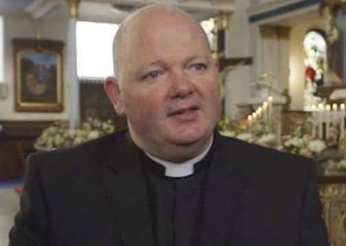 A priest who was spat upon and subjected to sectarian abuse during an Orange walk has described his ordeal.Canon Tom White says he was spat on twice while he spoke to parishioners outside St Alphonsus Church in Glasgow on Saturday afternoon.He told BBC Radio Scotland that he was called "Fenian scum", a "beast" and "paedophile" during the incident.Police are investigating the incident but the Grand Orange Lodge of Scotland said its members were not responsible.A police spokesman said that while the parade was passing at the time, involvement by someone from the Orange march was still to be established.