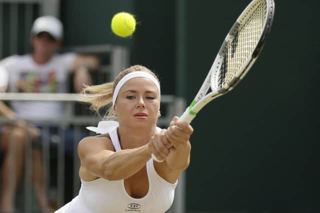 Italy's Camila Giorgi will play Serena Williams in the quarter-finals of Wimbledon. Pic: AP/Tim Ireland