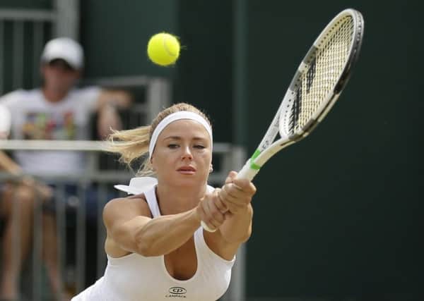Italy's Camila Giorgi will play Serena Williams in the quarter-finals of Wimbledon. Pic: AP/Tim Ireland