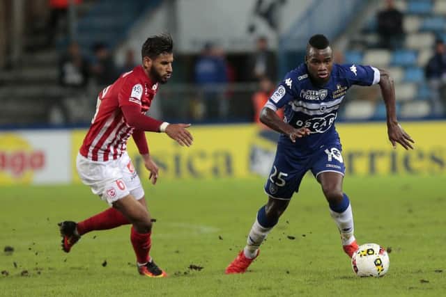 Lassana Coulibaly vies with Nancy's Youssef Ait Bennasser during a Ligue 1 match. Picture: AFP/Getty Images