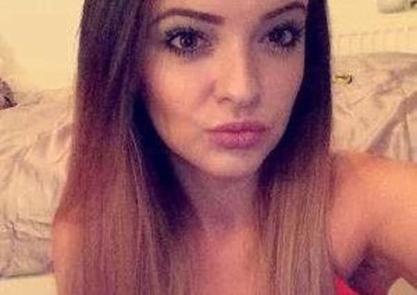 Larissa Bell, 21, celebrated alongside English fans by jumping on the ambulance in London