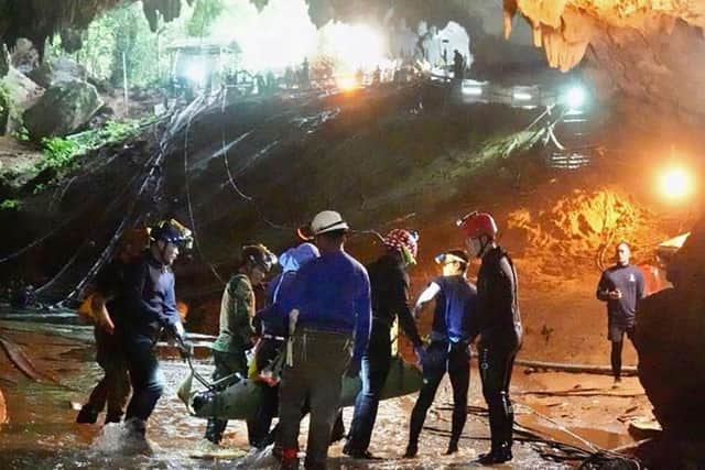 One of the members of the "Wild Boars" team being moved on a stretcher during the rescue operation at Tham Luang cave in Khun Nam Nang Non Forest Park in Mae Sai district.
 Picture: Getty Images
