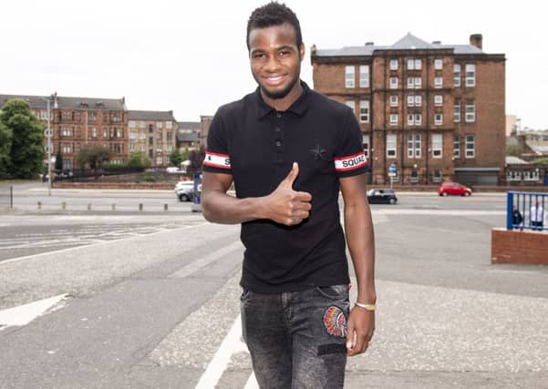 Lassana Coulibaly at Ibrox stadium after signing for Rangers. Picture: SNS/Ross MacDonald