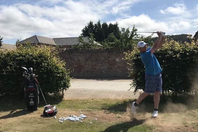 David Drysdale hits shots from his driving range.