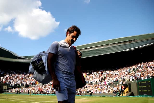 A dejected Roger Federer departs Court One after his defeat. Picture: Getty