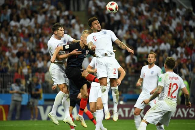 England defender Kyle Walker battles for an aerial ball with Croatia's Domagoj Vida. Picture: AFP/Getty