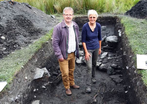 Brendan OHara MP with Dr Claire Ellis of Argyll Archaeology. Image courtesy of Kevin McGlynn