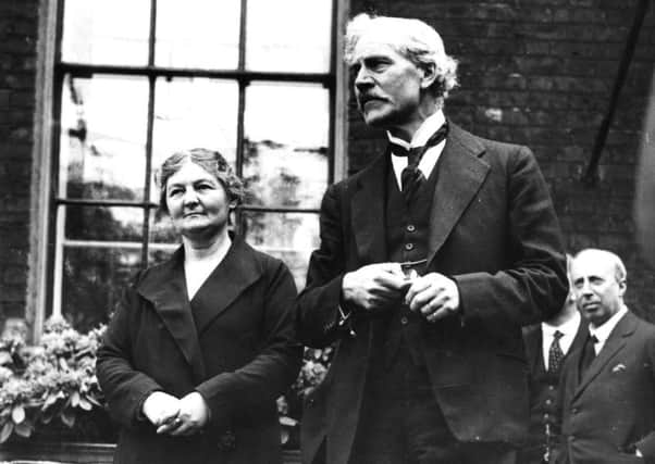 Ramsay MacDonald, seen with Margaret Bondfield, the first female Cabinet Minister, was Prime Minister when his Labour government collapsed and he formed a national coalition under his leadership (Picture: Central Press/Getty)