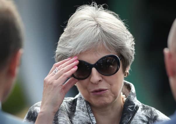 Theresa May appears to be trying to make the best of a bad job on Brexit (Picture: Andrew Matthews/PA)